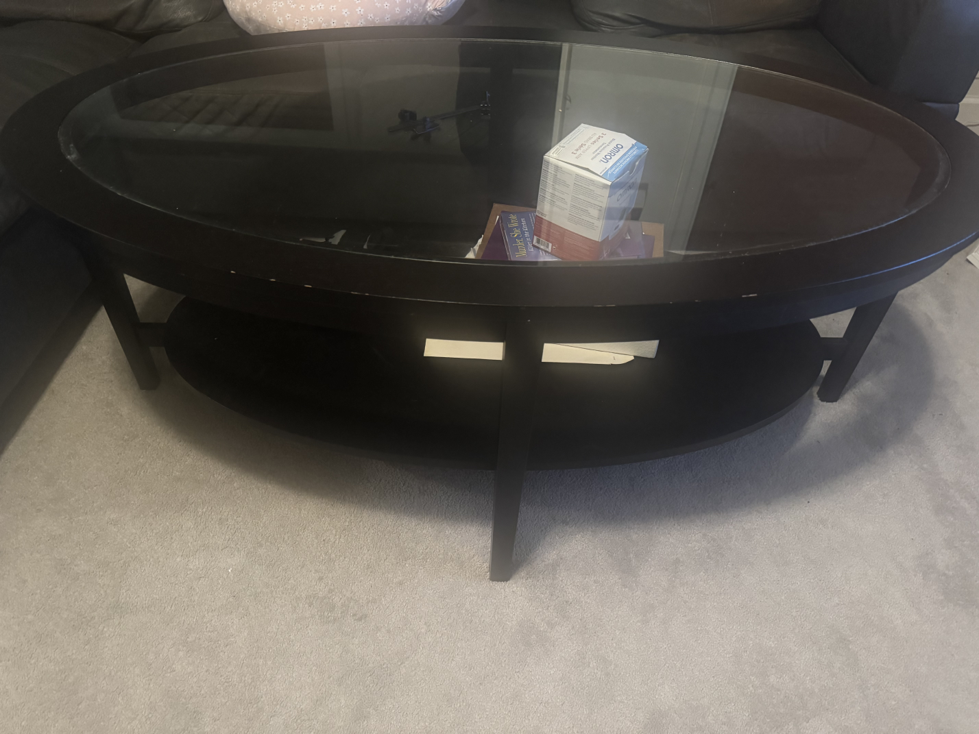 sectional sofa and glass coffee table