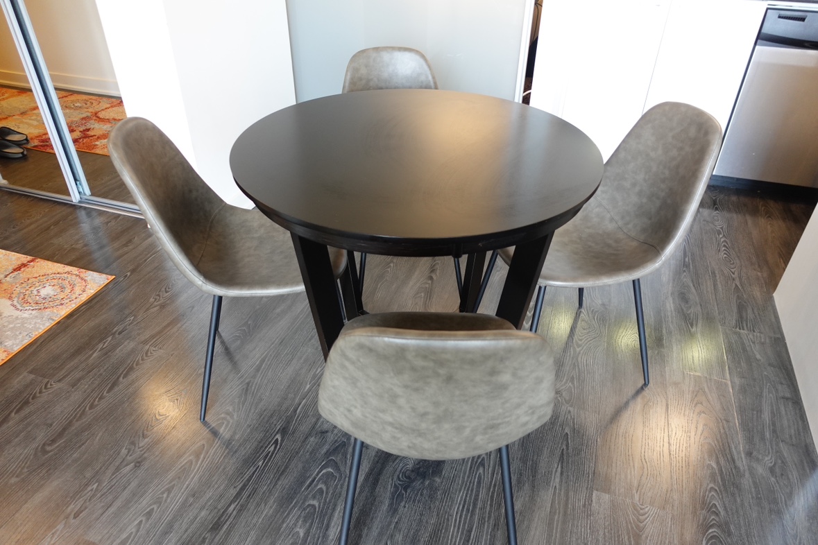 Round Solid Wood Dining Table with 4 Faux Leather Side Chairs