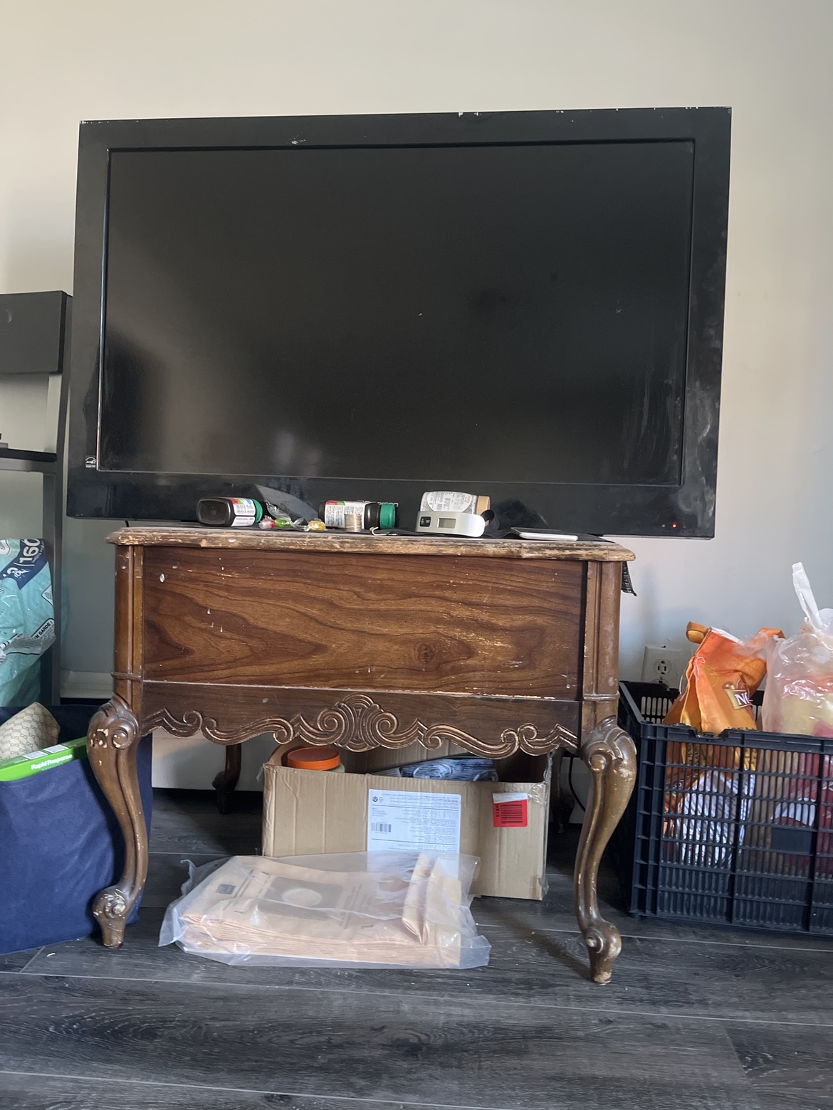 Brown antique tv table