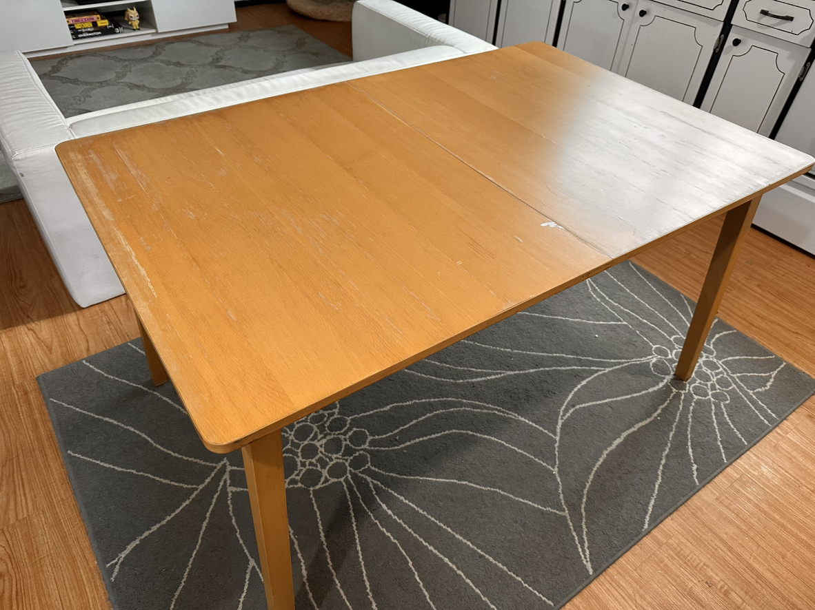 Dinning table with central extension