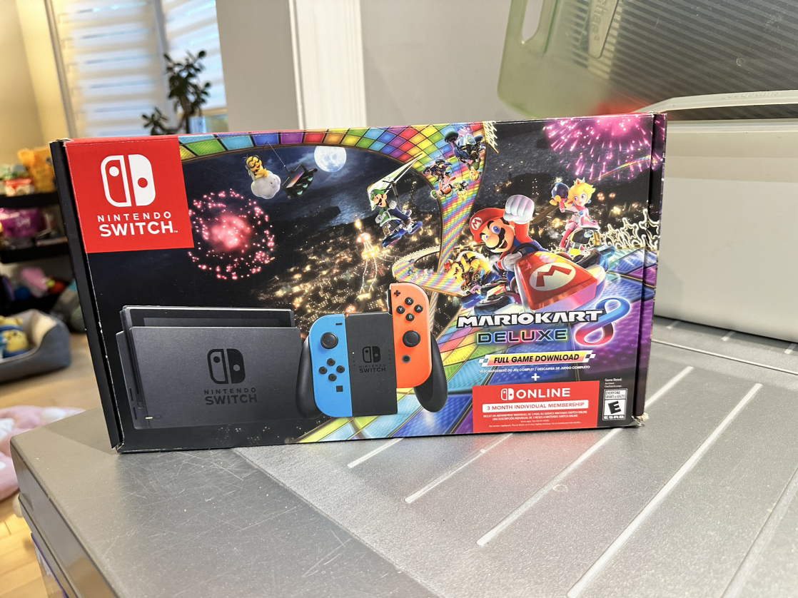 Nintendo Switch (like new condition)