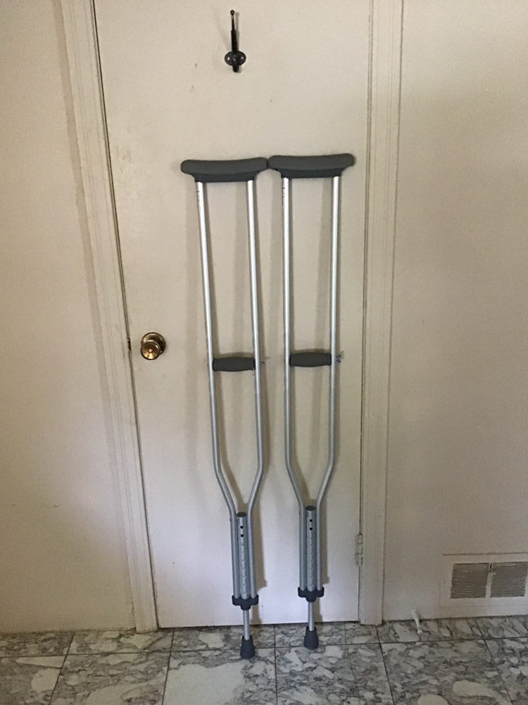 Pair of metal crutches