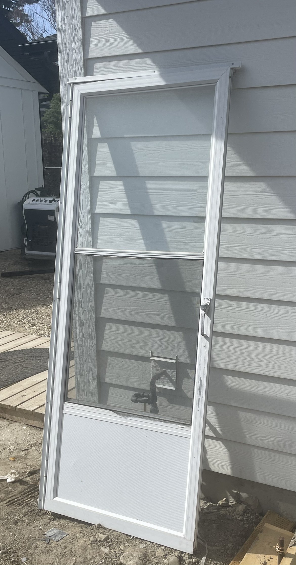 White screened Storm Door