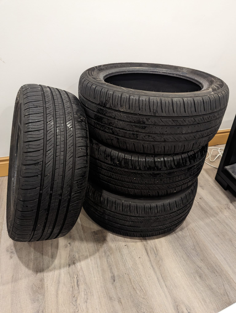 Four all season 215/55 R17 Tires, 80% Tread