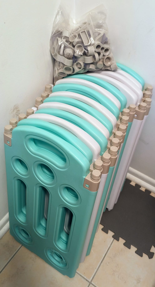 Play pen with door.