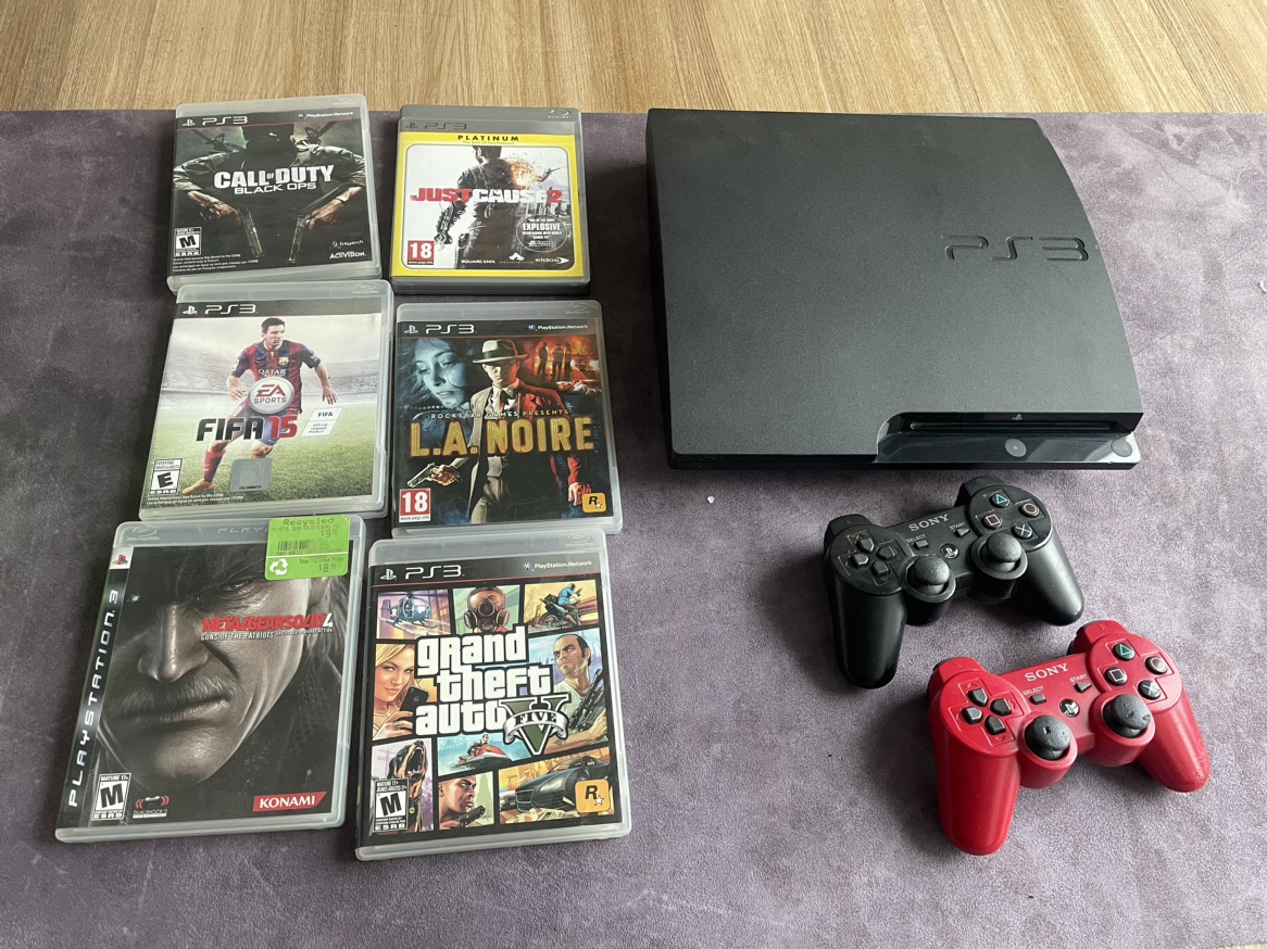 PS3 console for sale - 6 free games - no controllers