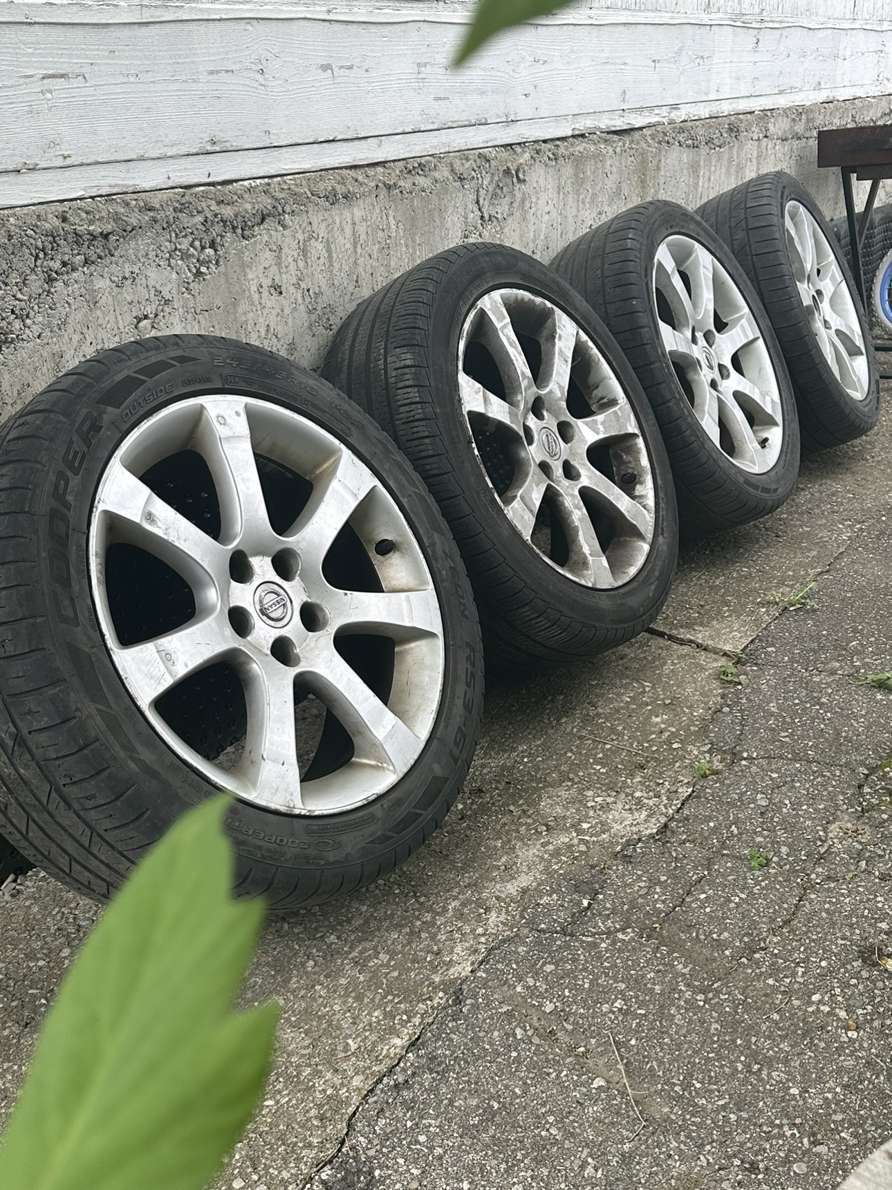 18 Inch Nissan rim with summer tire for sale thumbnail