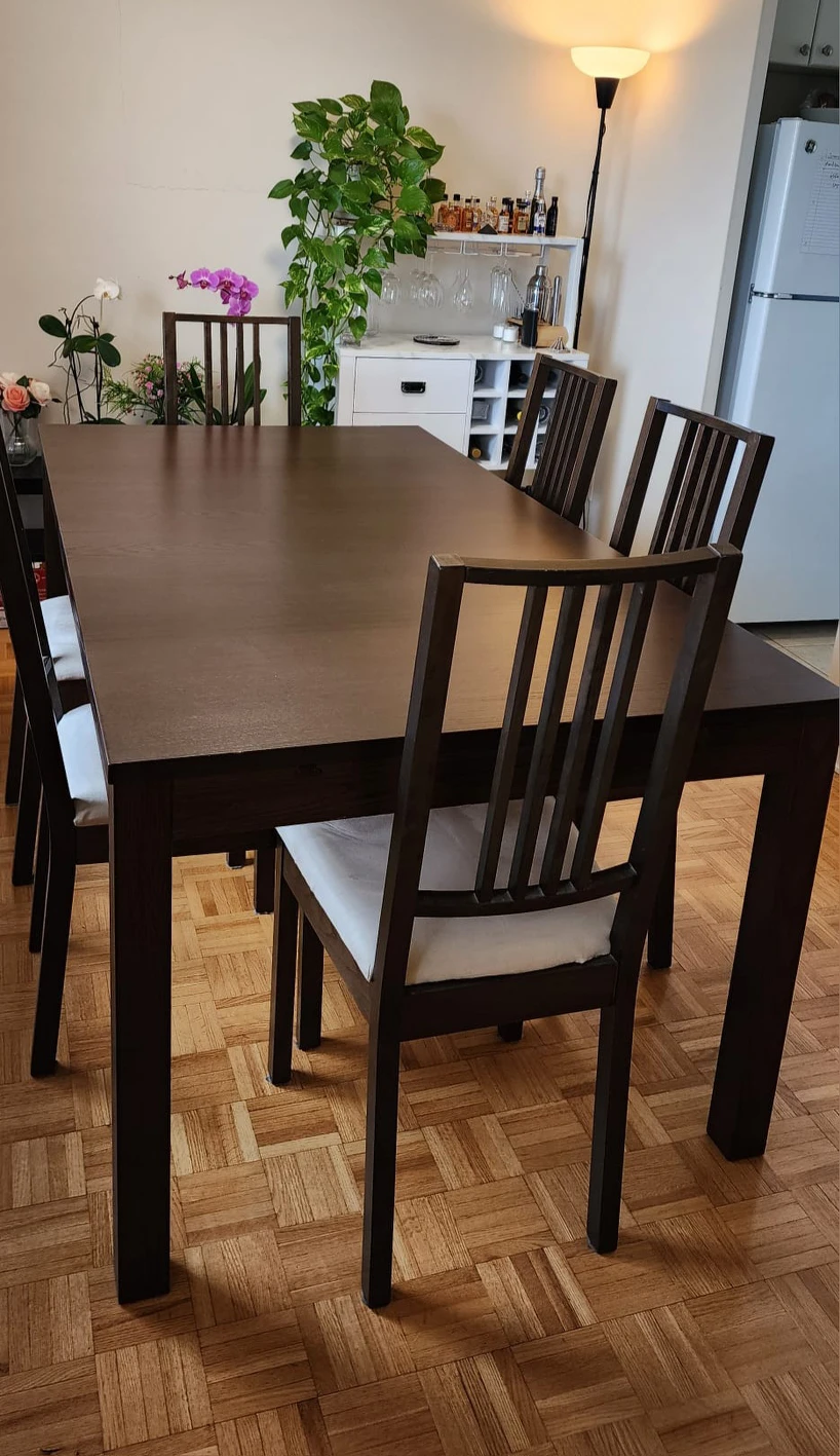 wooden expandable dining table with wooden chairs