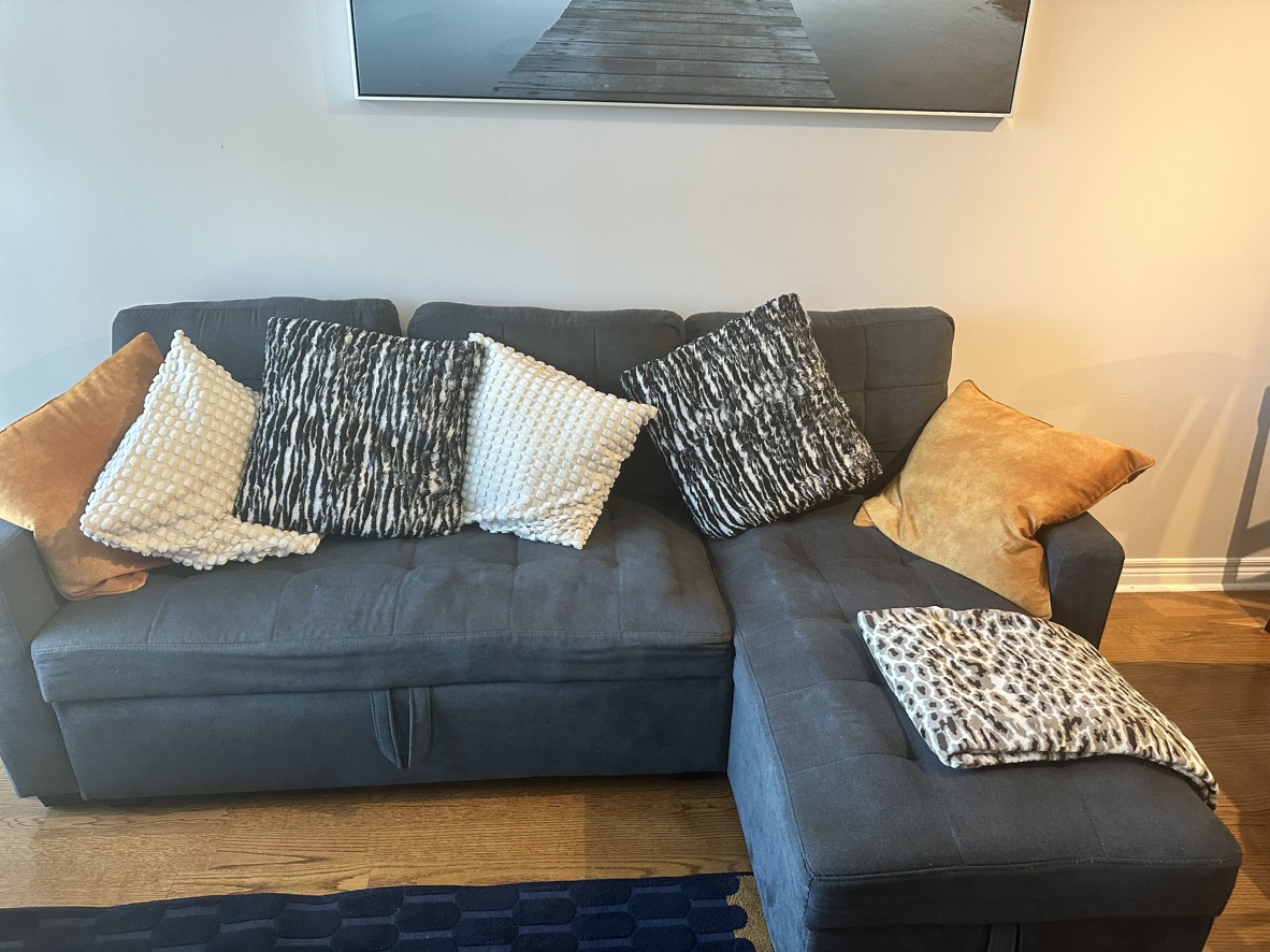 Sectional sofa with storage - less than a year old! - photo 2