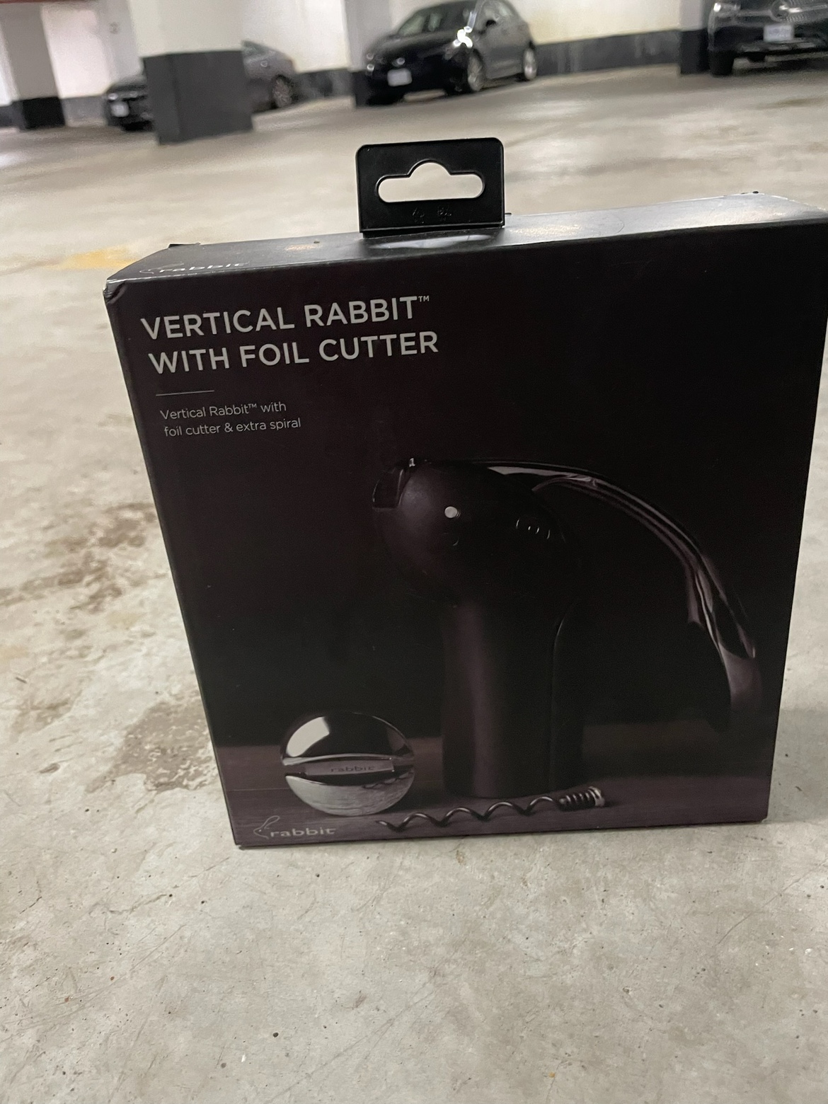 Vertical rabbit with foil cutter bottle opener