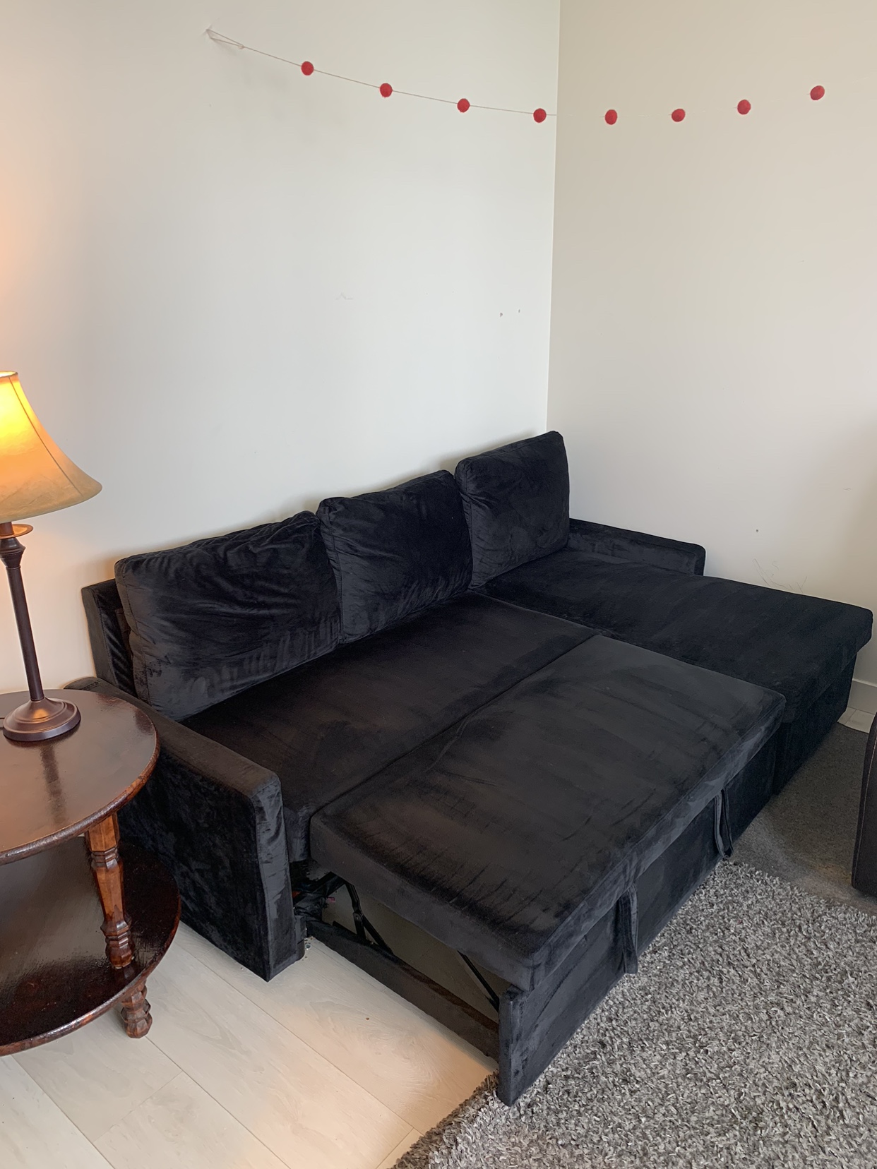 Black sofa cum bed - photo 2