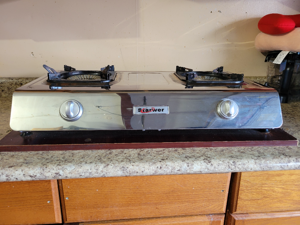 Kitchen Stainless stove/ propane cylinders