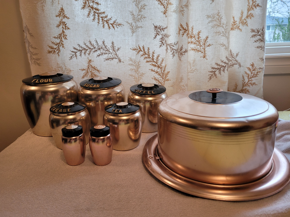 Westbend canister set and cake keeper