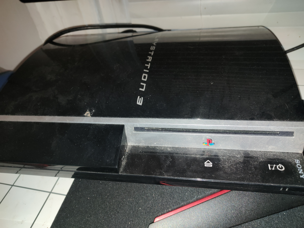 PS3 with one controller and power cord OBO