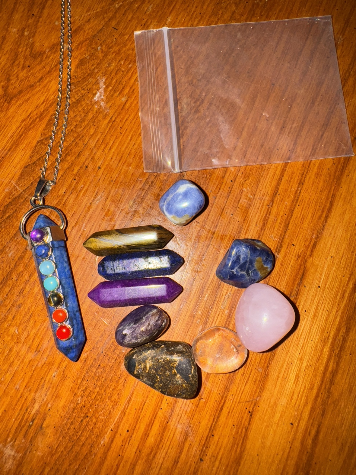 Bag of crystals and chakra necklace