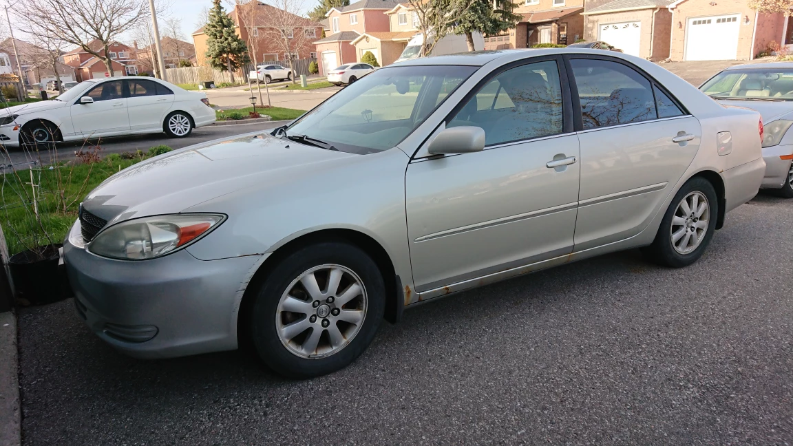 2003 Camry XLE with summer and winter tires and rims - photo 2
