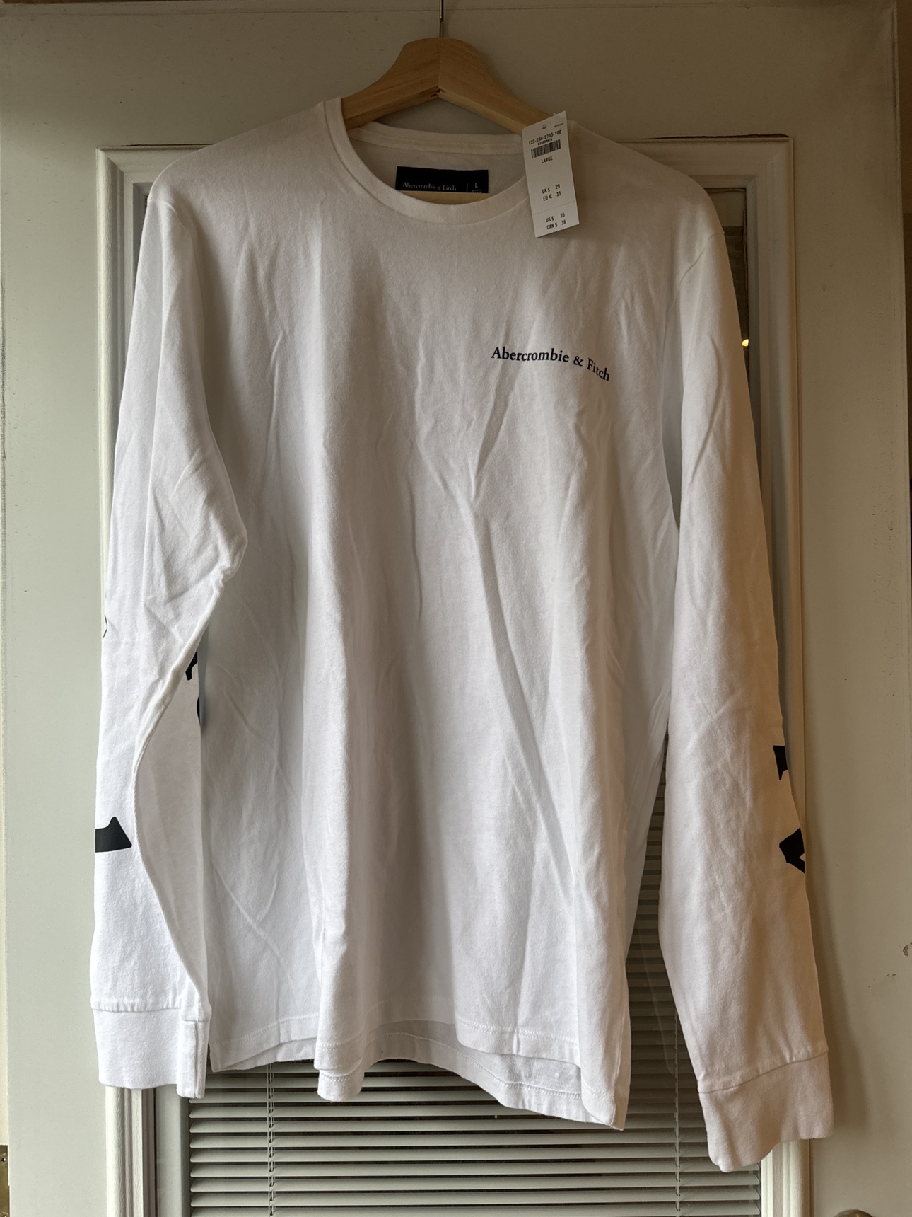 New White long sleeve. MEN LARGE image indicator(2)