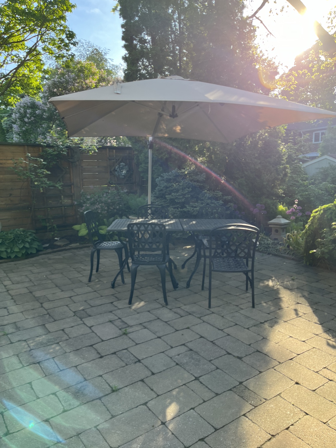 Table, chairs and umbrella