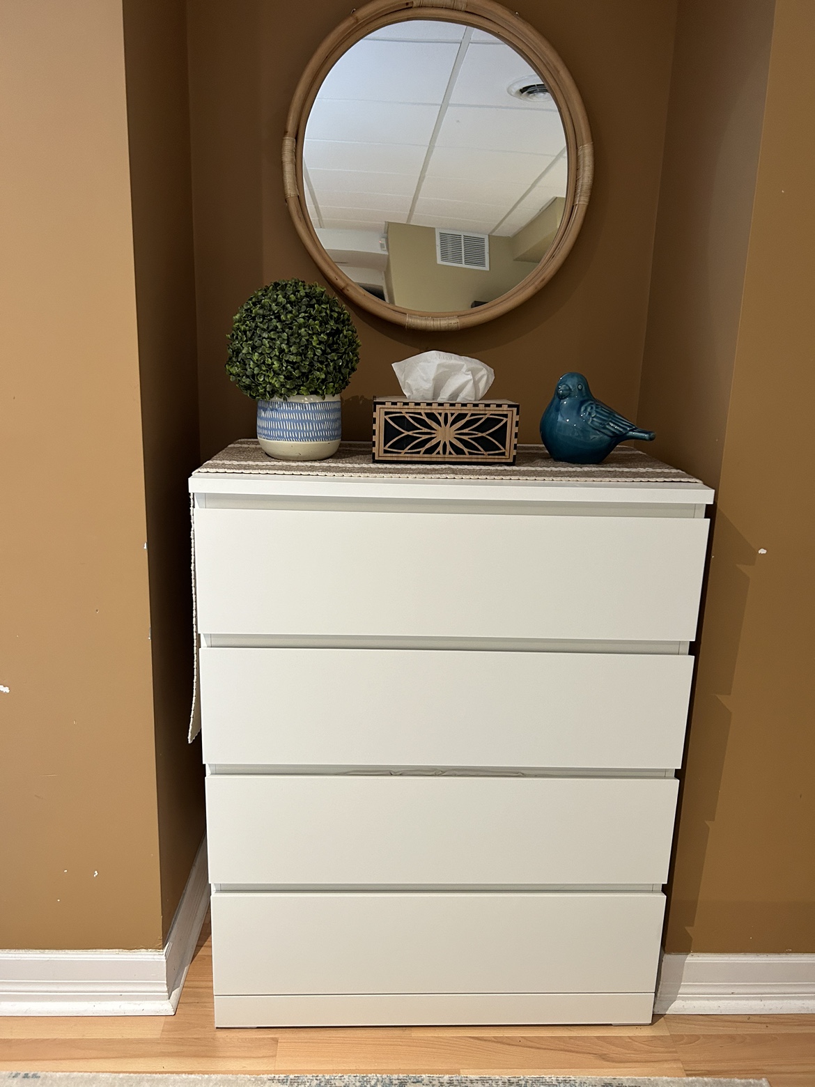 Chest of drawers and mirror