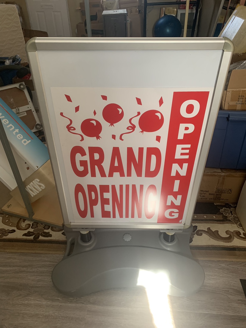 Spring loaded signs