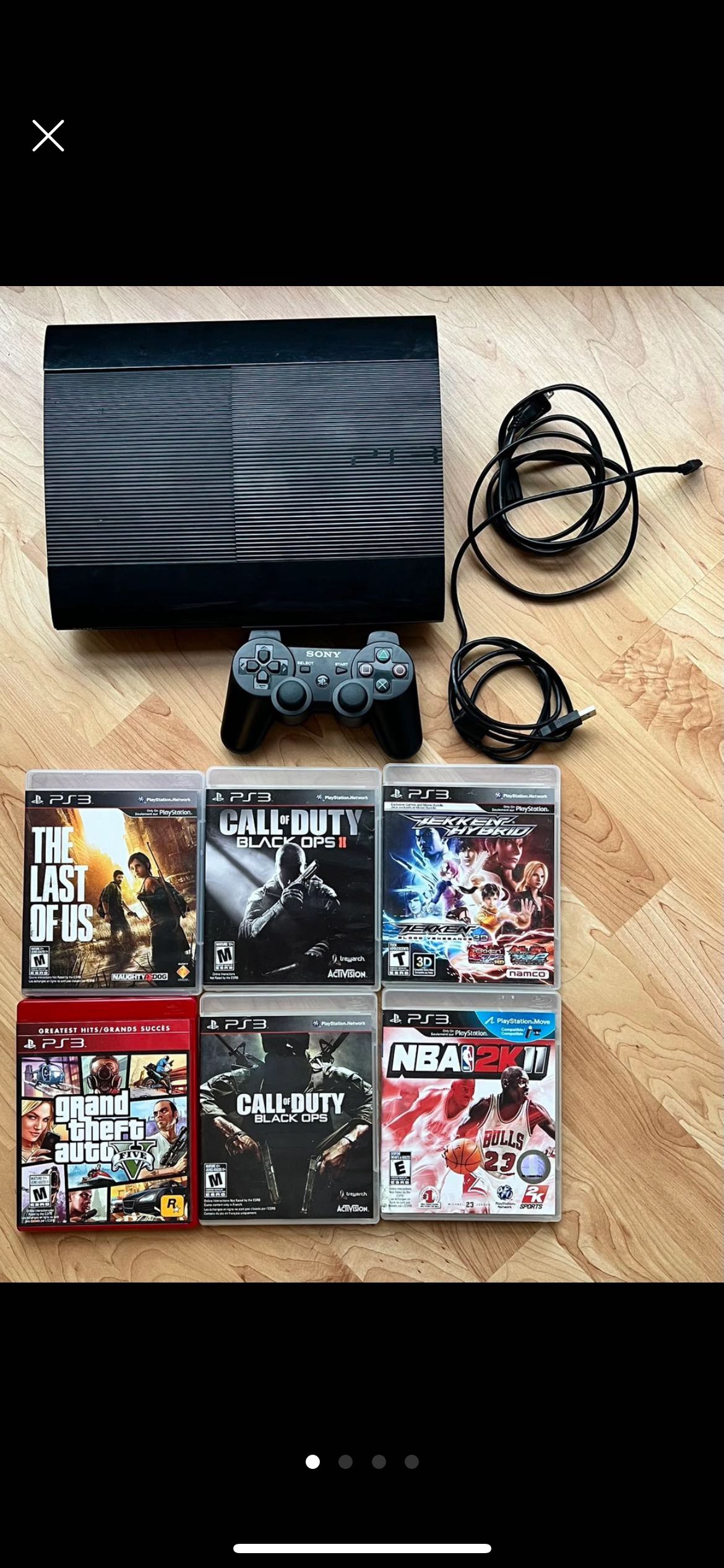 PS3 with games and controller
