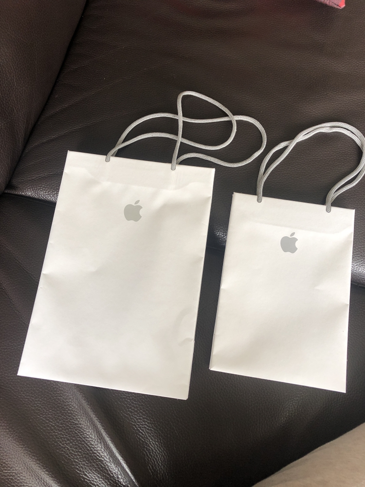 Apple shopping bags.