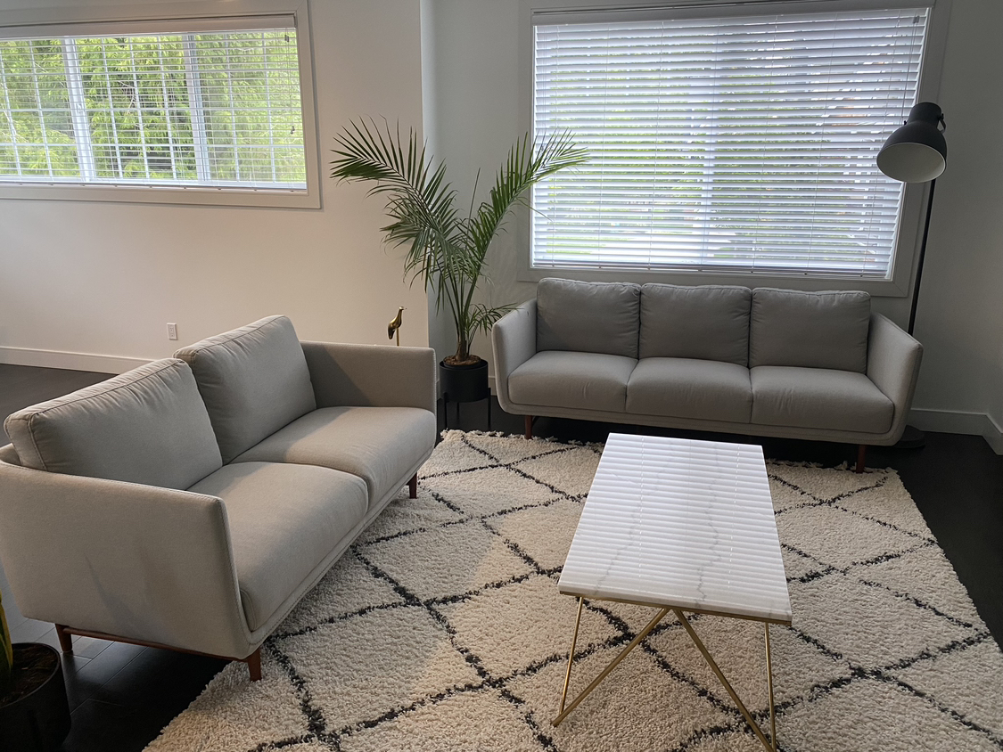Two grey like new sofas