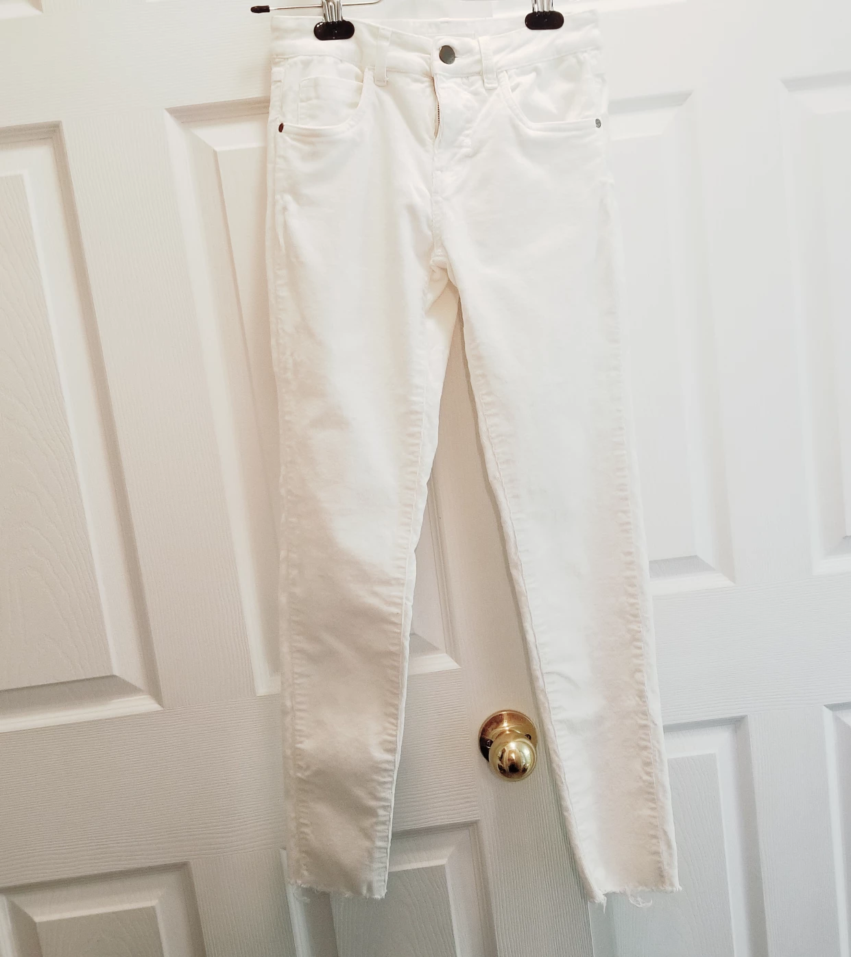 White Thin Corduroy Slim Fit Pants w/ Frayed Ankle image indicator(2)