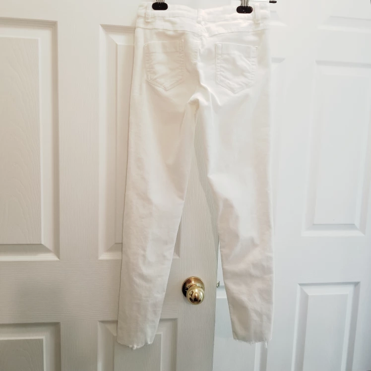 White Thin Corduroy Slim Fit Pants w/ Frayed Ankle image indicator(3)