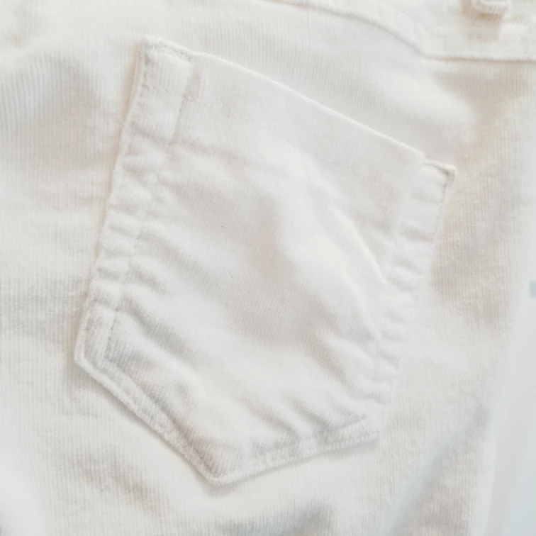 White Thin Corduroy Slim Fit Pants w/ Frayed Ankle image indicator(4)