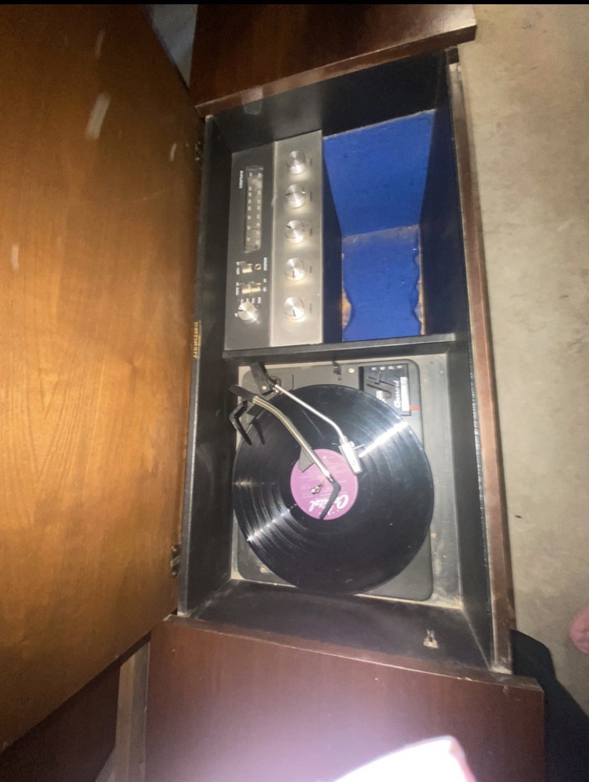 Vintage console stereo. Turntable, Radio AM&FM