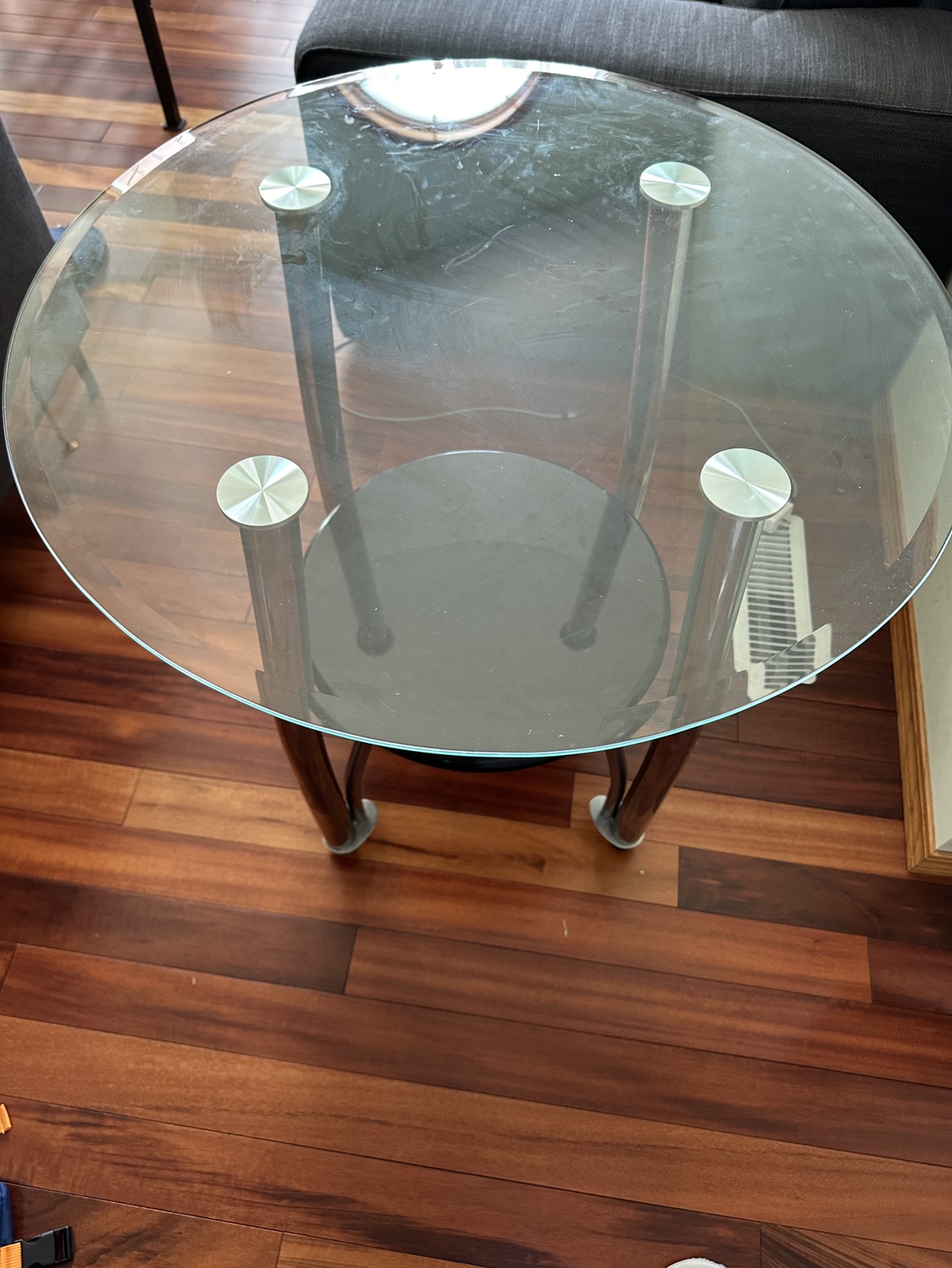 Pair of round glass tables in good condition. For sale!