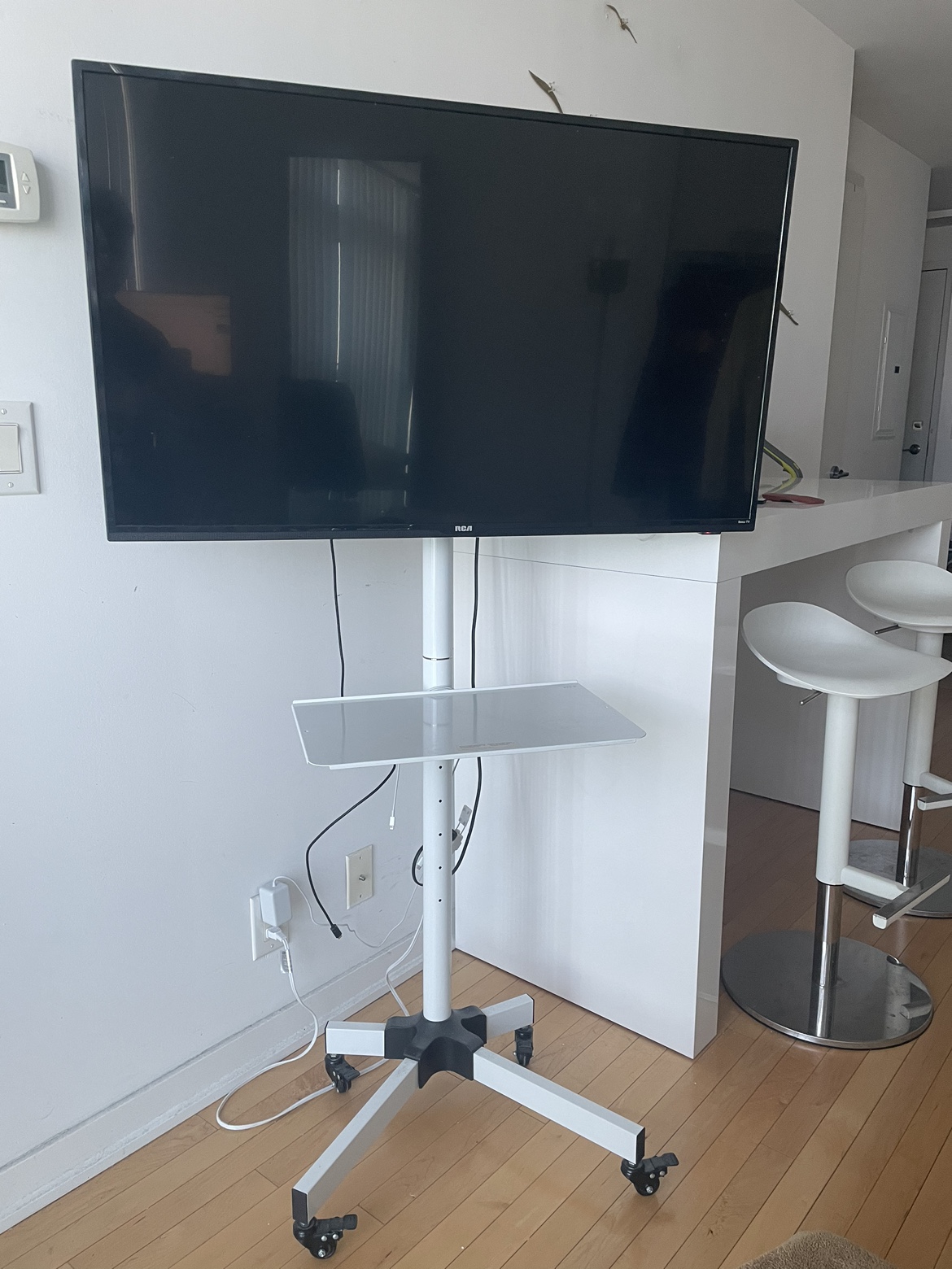 43" RCA ROKU TV WITH MOBILE STAND (Moving Out Sale)