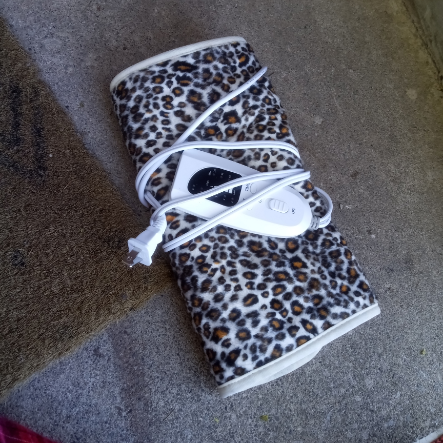 (new) leopard plug in heating pad thumbnail