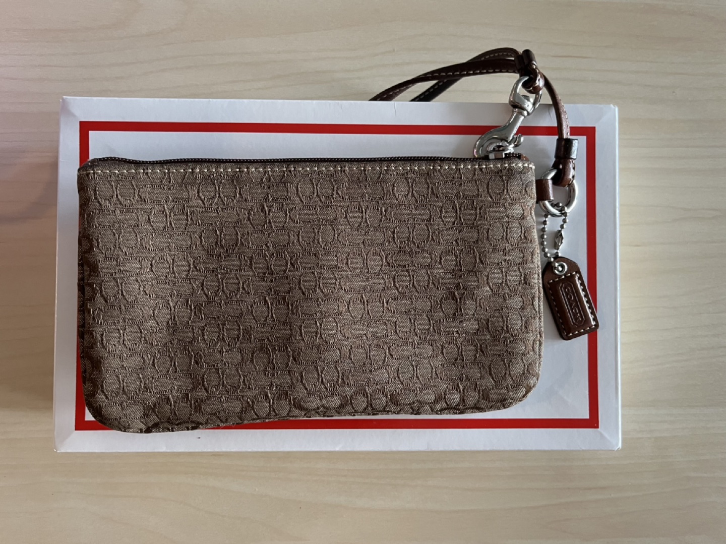 Coach wristlet with box (two compartments) image indicator(2)
