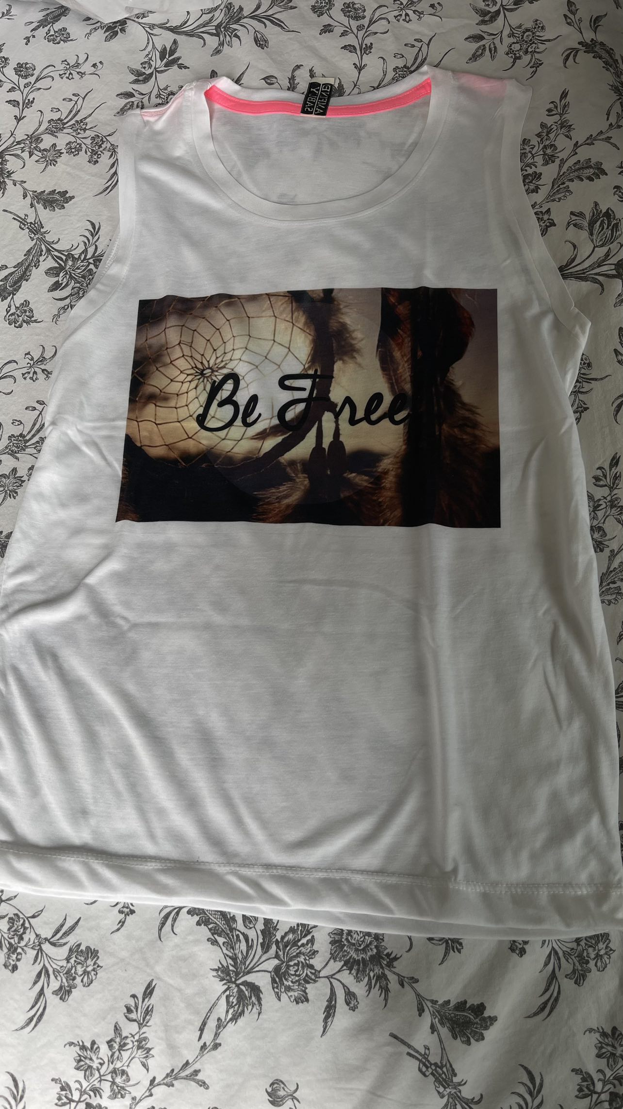 Sleeveless T-shirts - photo 4