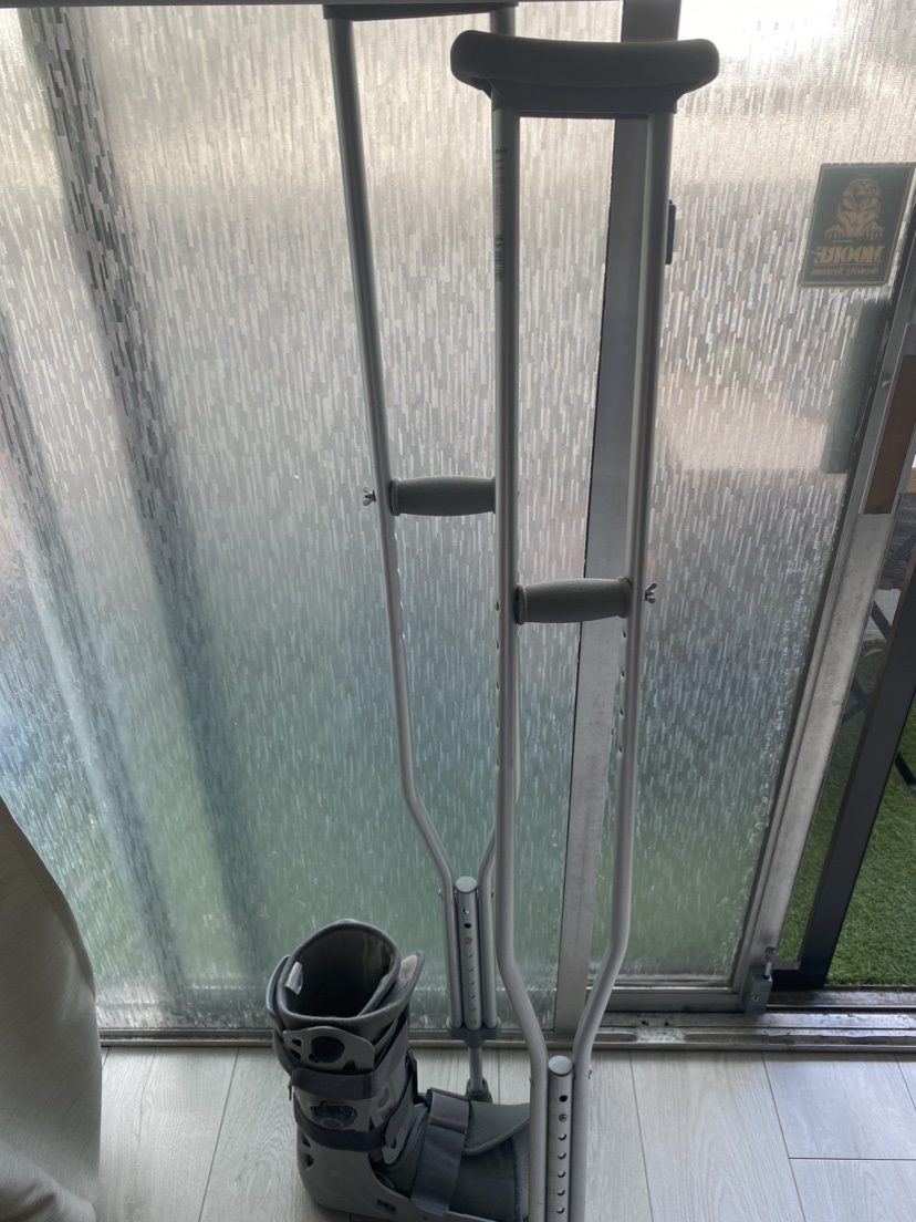 Crutches and walking boot
