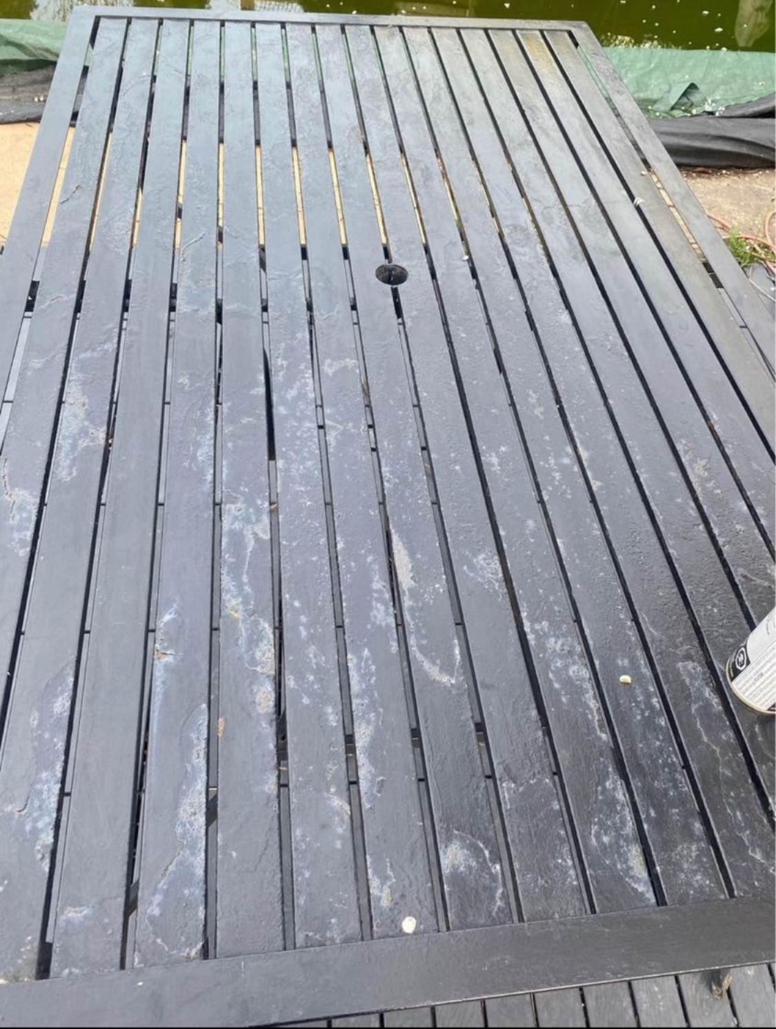 Patio table needs repainting or just put tablecloth on image indicator(2)