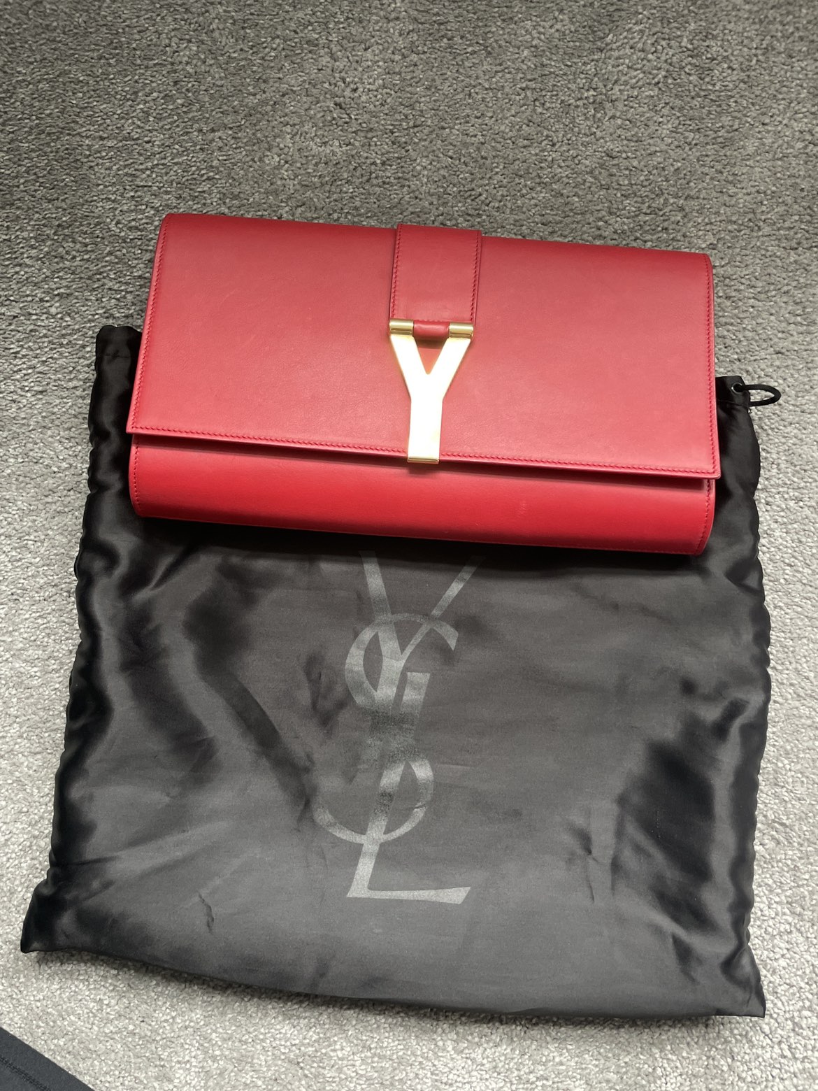 Red YSL large clutch bag