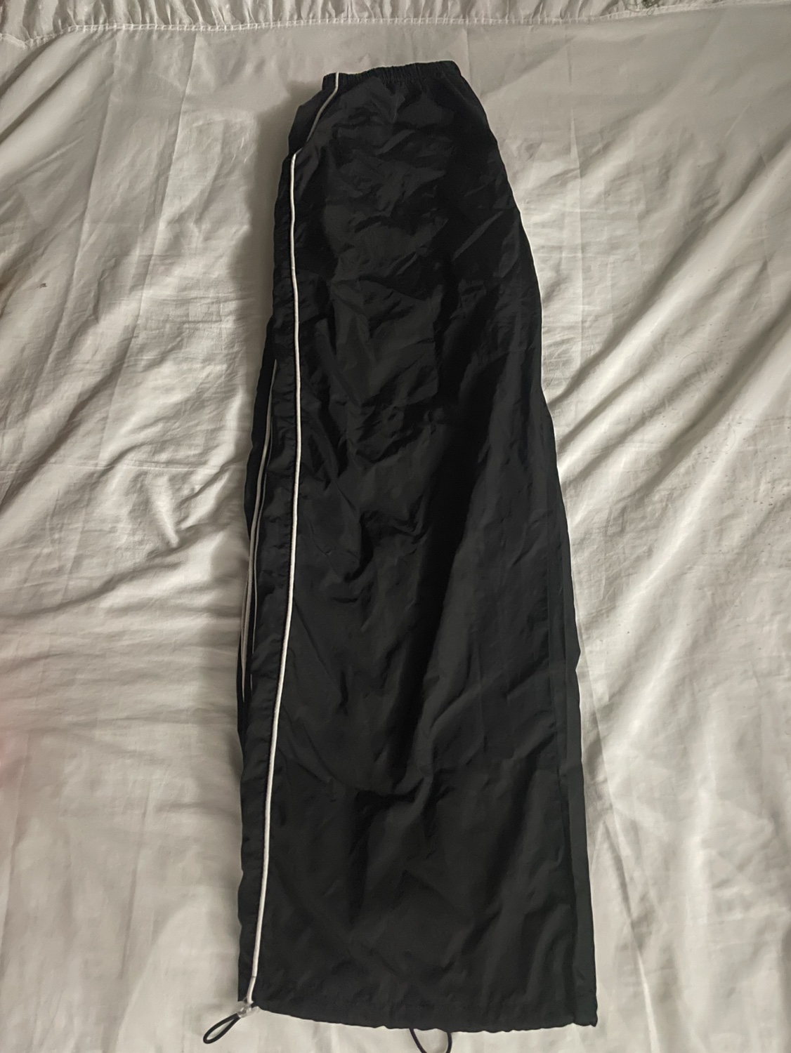 Black parachute pants