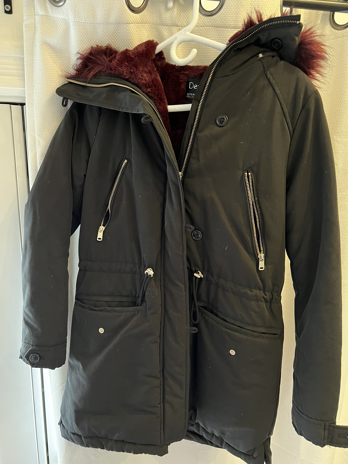 Black coat with red faux fur