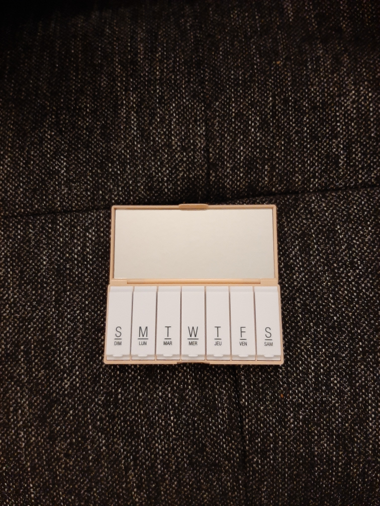 Medicine organizer with small mirror thumbnail