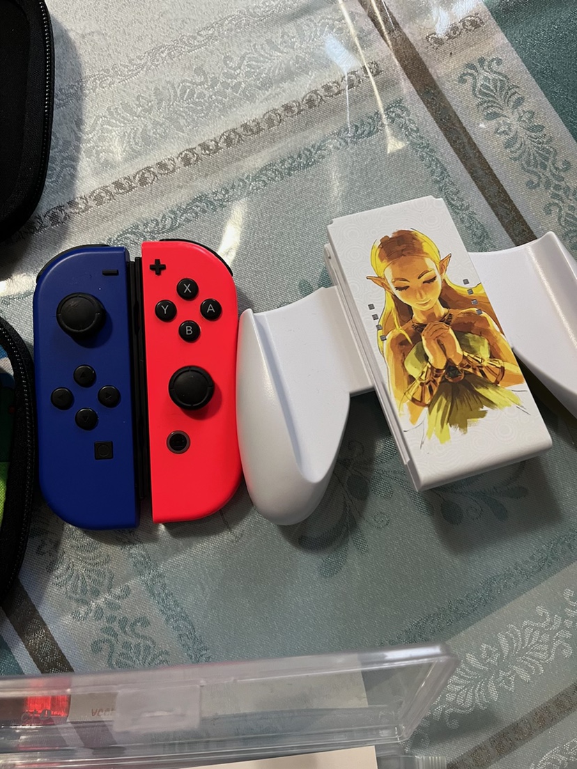 Two joycons and joycon adapter