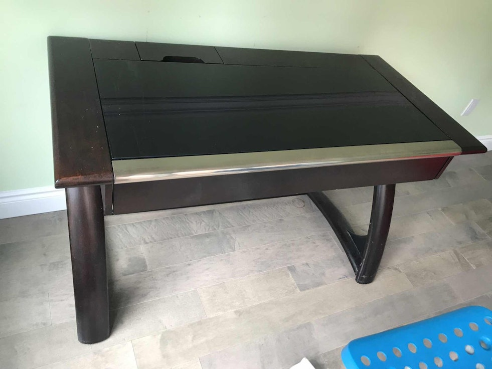 metal, glass wood desk with electric ports. excellent condition.