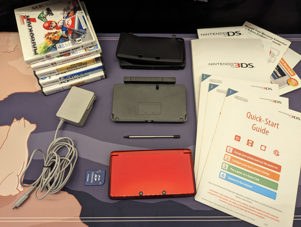 ORIGINAL Nintendo 3DS, charger, dock, games, SD card, case thumbnail
