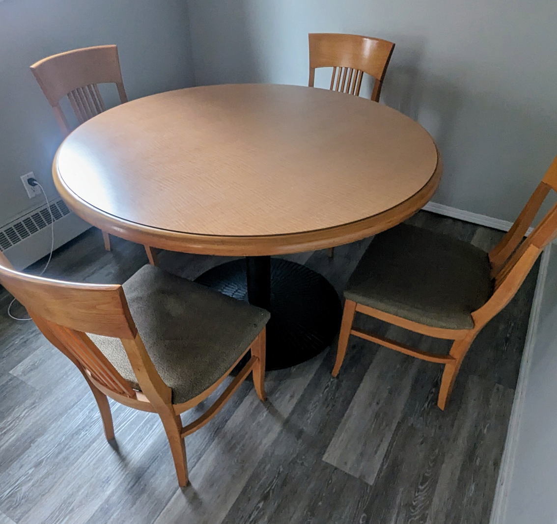 4ft round table + 4 cushion chairs