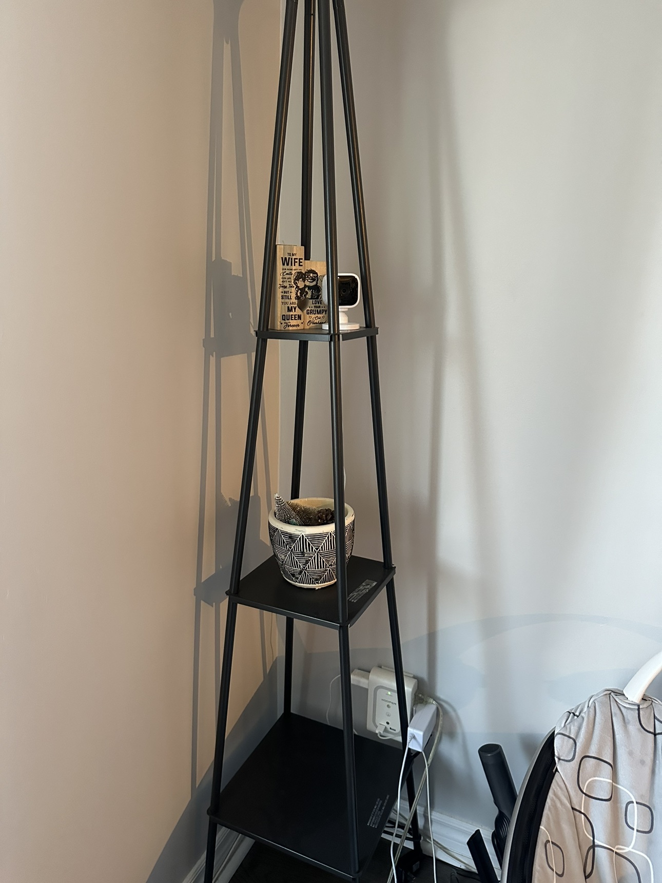 Black floor lamp with shelves