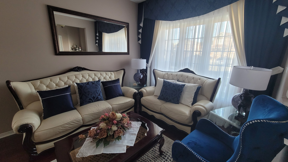 Two Beige couches & Coffee table