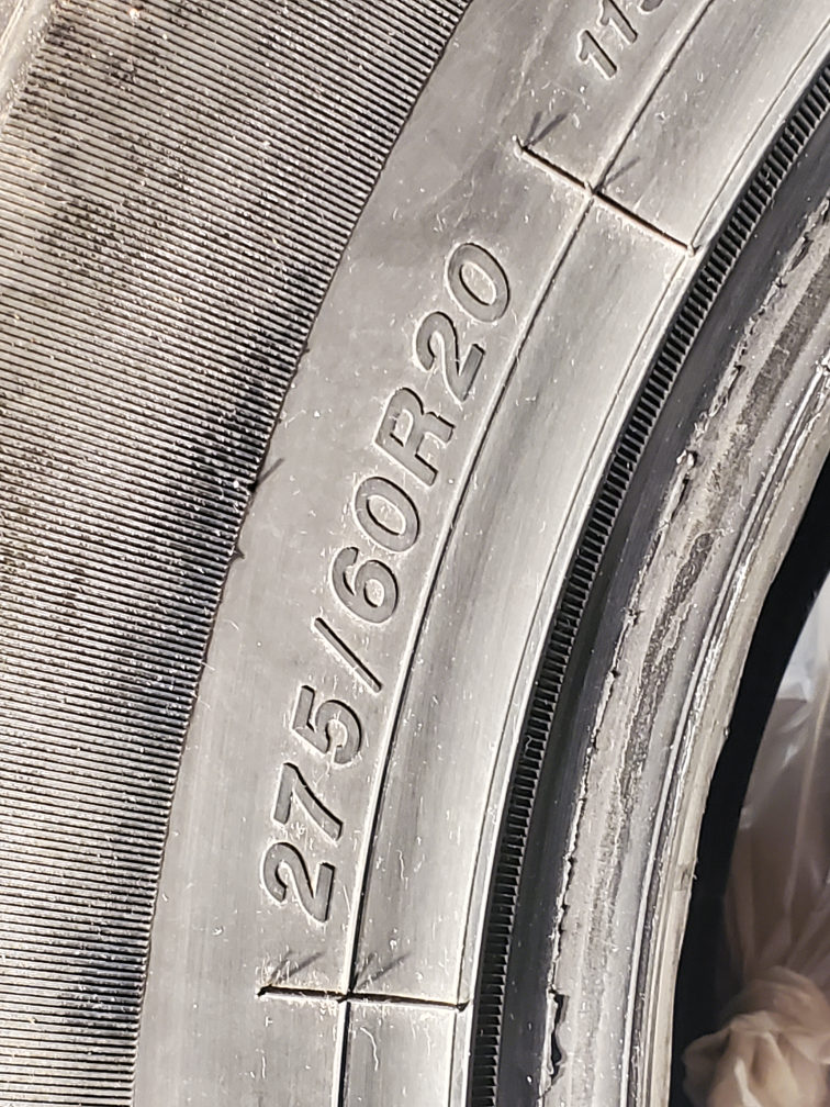 Four 275/60R20 Ice Blizard studded tires thumbnail