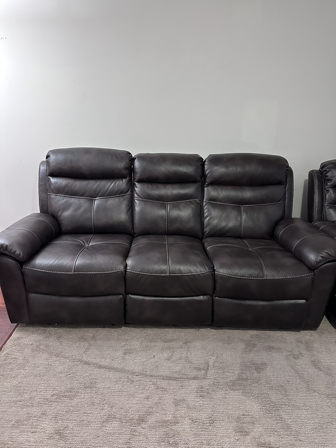 Leather sofa recliner
